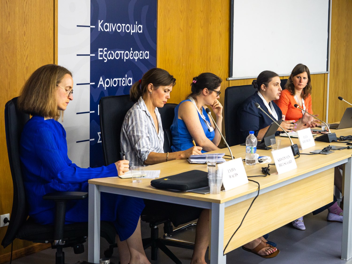 A panel of speakers during a session.