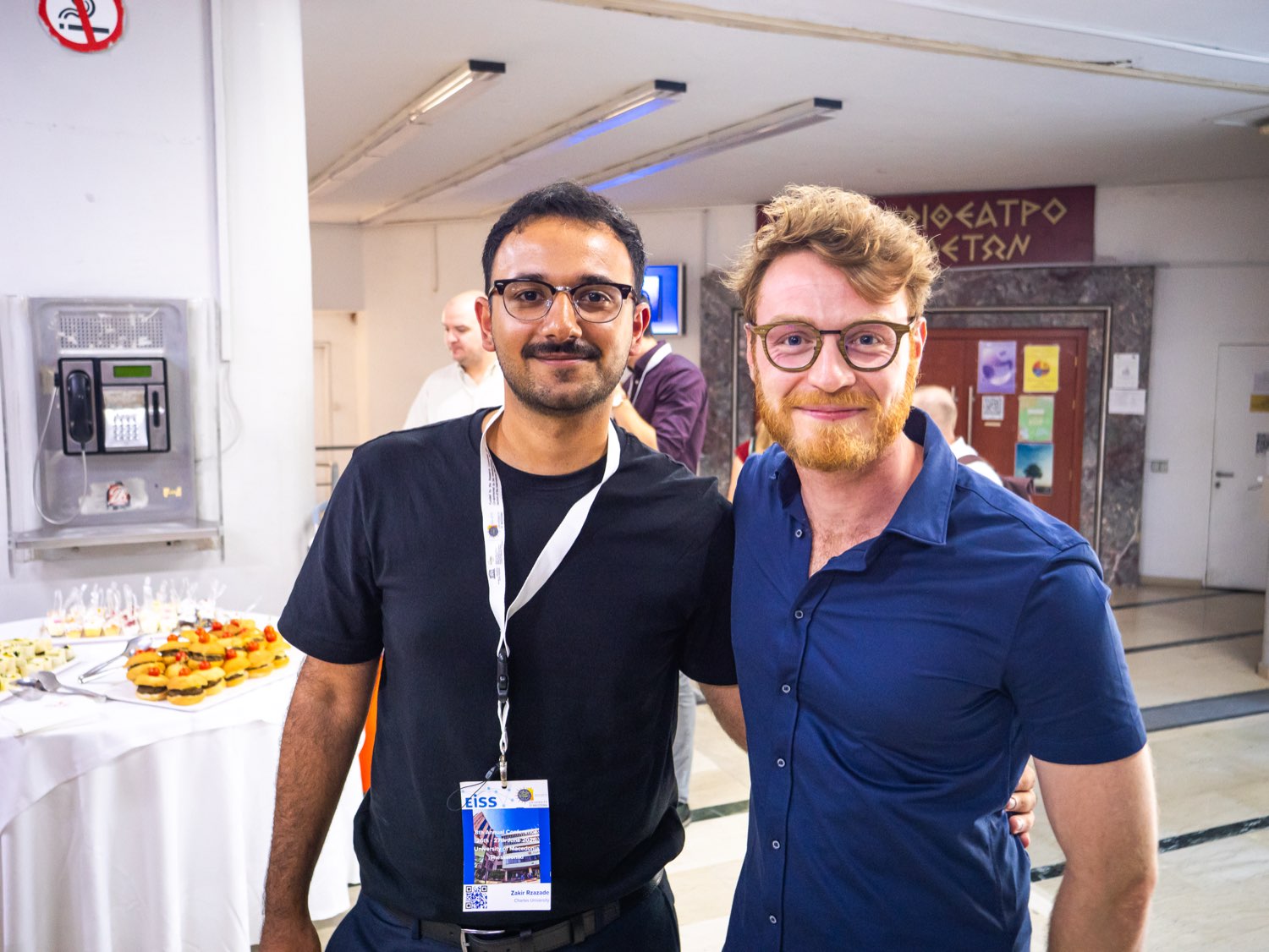 Two participants during the conference reception.