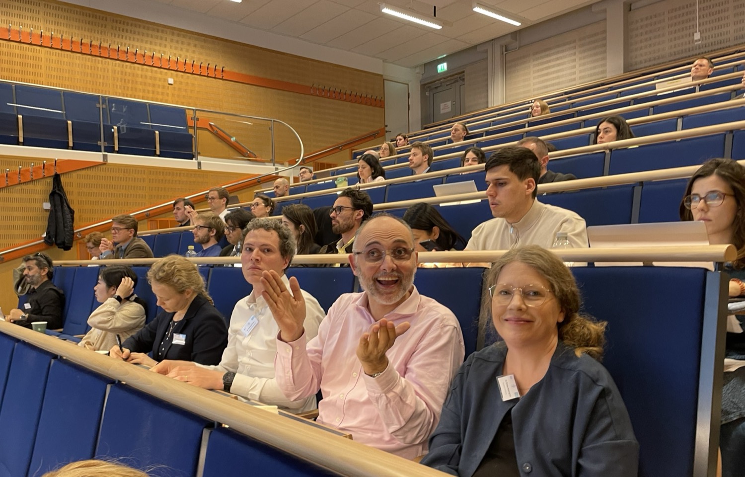 The audience in the auditorium during a conference session.